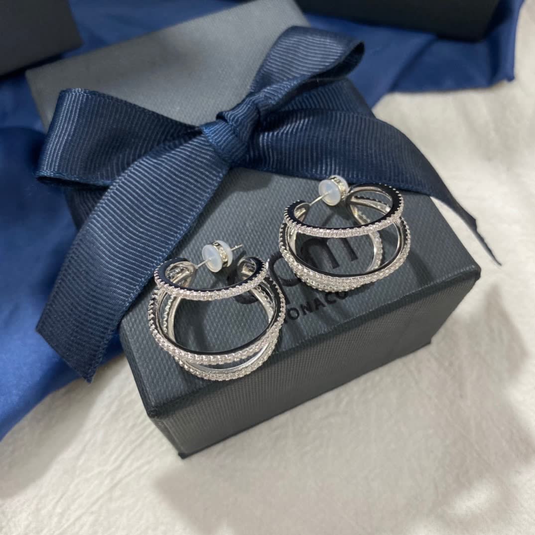 APM Monaco Elegant Silver Hoop Earrings with Diamond Accents